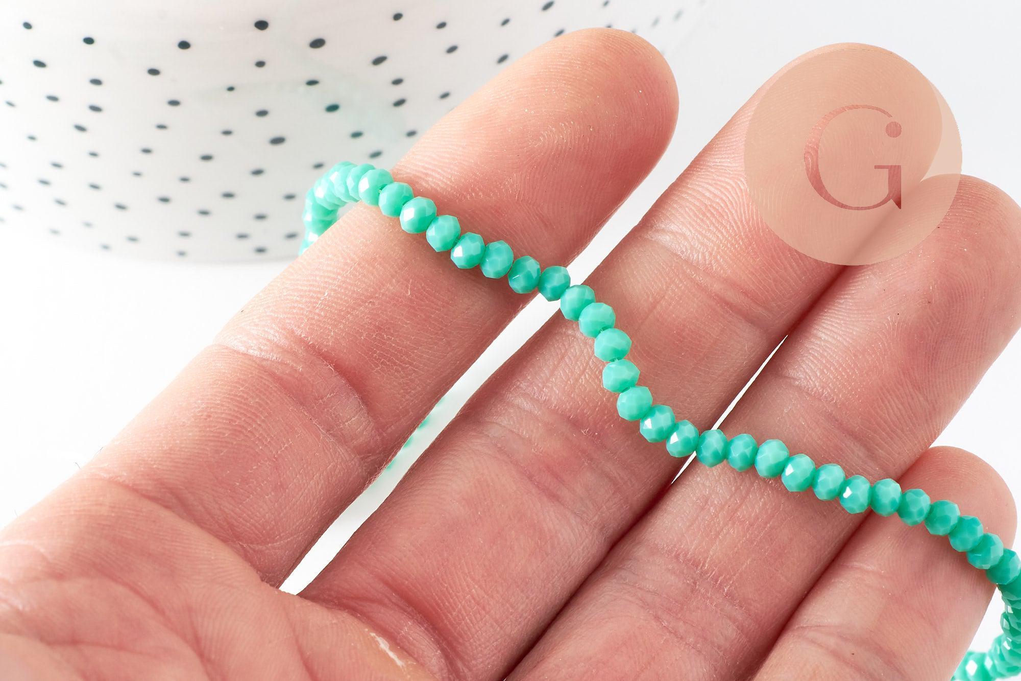 Perles toupies vert émeraude, perles bijoux, cristal vert, verre facette, fil de 42cm, 3mm, x1 (G3908)