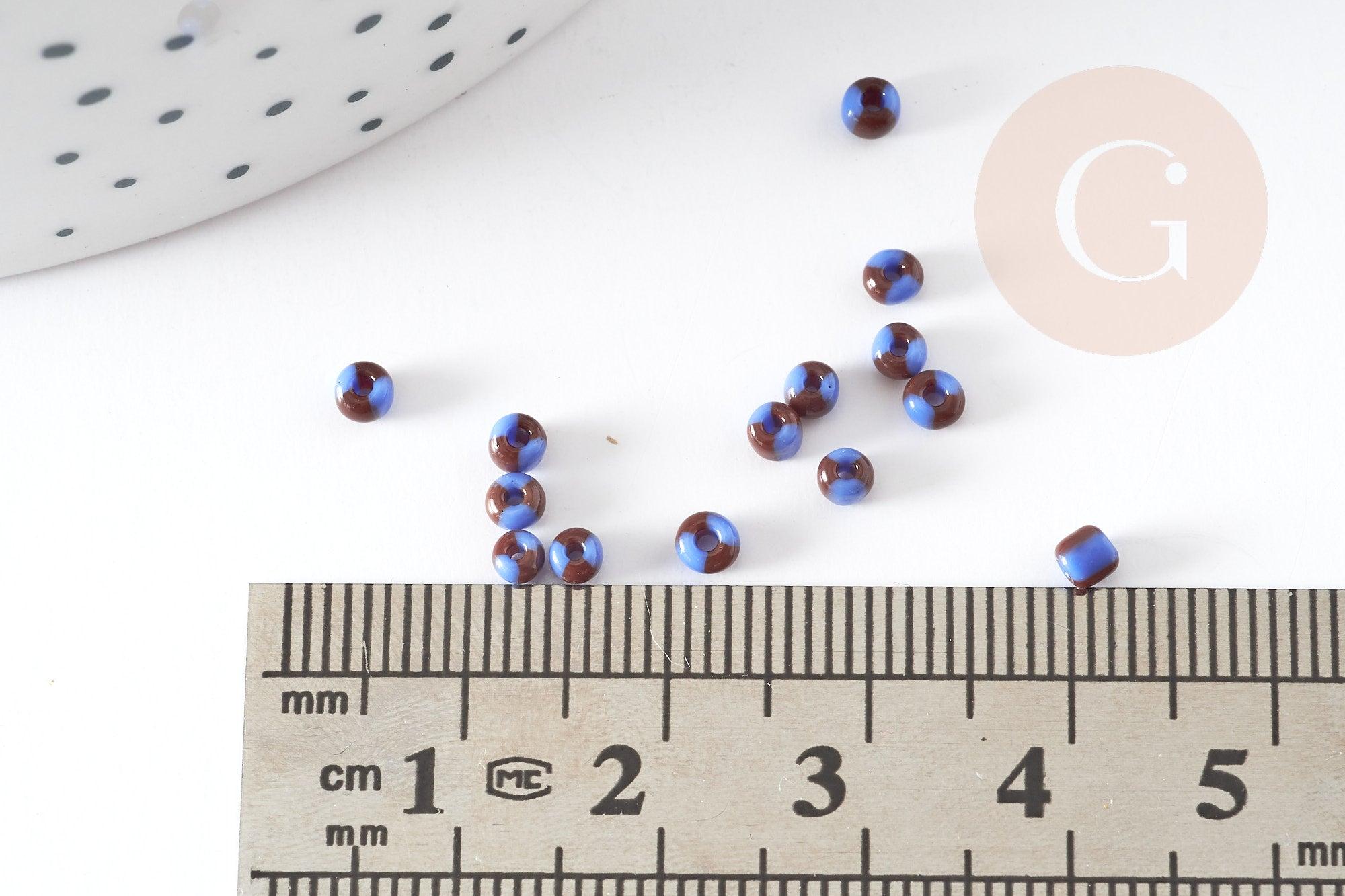 Petite Perle rocaille rayé noir bleu 2.5x3mm, x 10gr (G3675)