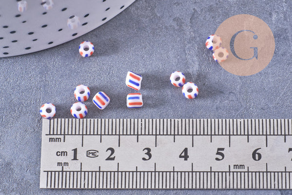 Petite perle rocaille verre rayé bleu blanc rouge 3x4.5mm, x10 Gr (G10709)