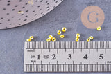Petite perle rocaille verre rayé jaune blanc 1.5x2mm, x10 Gr (G10684)