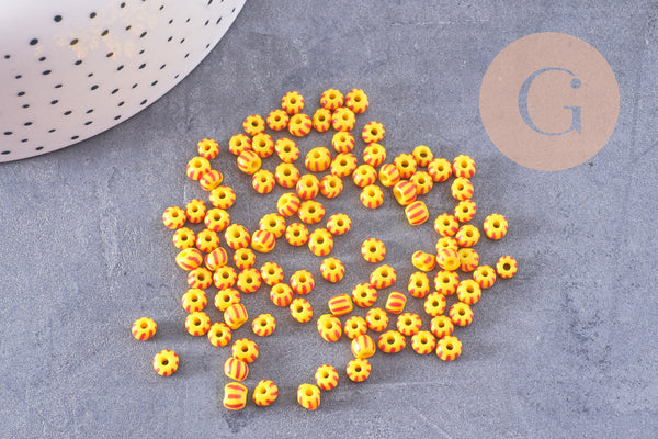 Petite perle rocaille verre rayé jaune rouge 3x4.5mm, x10 Gr (G10683)