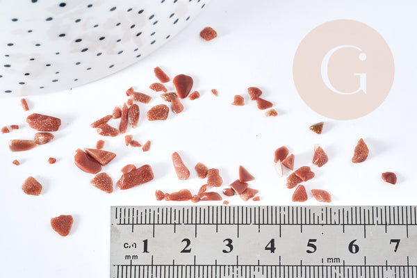 Sable chips pierre du soleil de synthèse 2-8mm non percé, x20gr (G8630)