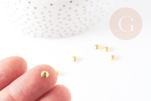 Perles intercalaires rondelles gravées zamac doré 6mm, x50 (8.10gr) (G0181)