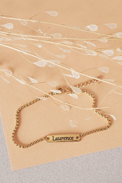 Gravure personnalisée sur bijoux – Médailles, pendentifs et cadeaux uniques