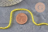 Perles cristal toupies à facette jaune transparent 3-3.3mm, x1 fil de 38cm (G11110)