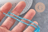 Perles cristal toupies à facette bleu transparent 3-3.3mm, x1 fil de 38cm (G11112)