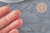 Perles à écraser laiton platine 2x1.2mm, x1 gramme (G11208)