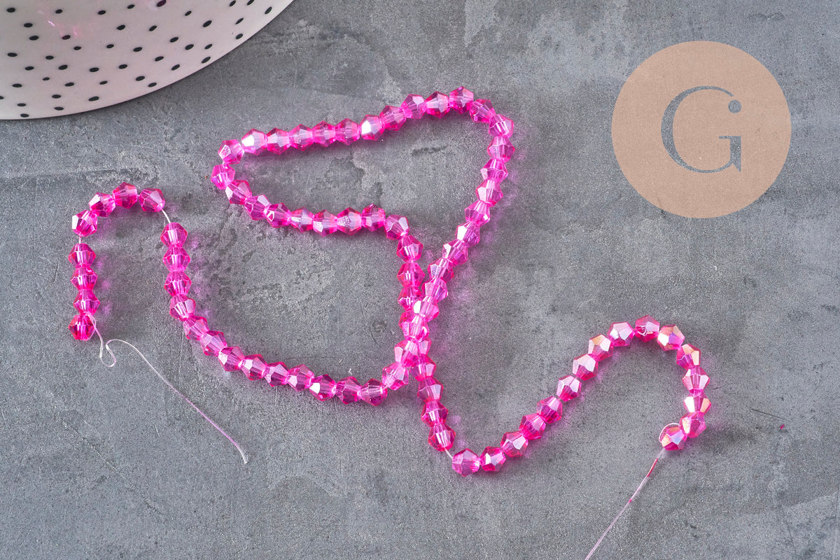 Perles toupies cristal à facette rose fuchsia irisé 4.5mm, x1 fil de 28cm-Perles-Gingerlily Perles