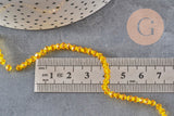 Perles toupies cristal à facette jaune 3.8x3mm, x1 fil de 32.5cm (G11343)