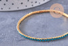 Bracelet élastique laiton doré strass bleu 50mm, x1 (G3960)