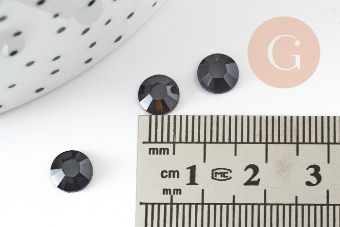 Cabochon rond strass plastique noir reflets ronds 7mm, x 5g (G2248)
