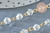 Chaine perles acrylique géométrique facettée 6mm fer doré, x1 mètre (G7354)
