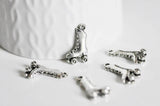 EP Breloques roller argent tibétain,fournitures créatives,argent tibétain,patin à roulettes, breloque argent, création bijoux, x 5,G2403