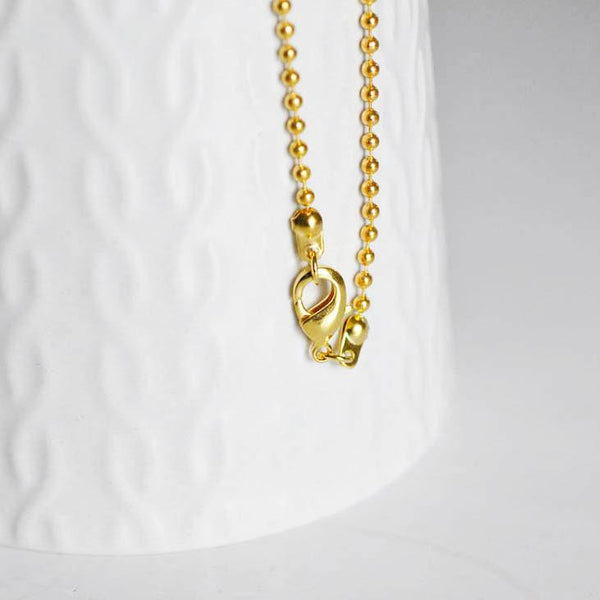 EP Chaine fine dorée boule 1.5mm/40cm, x1 -G1661