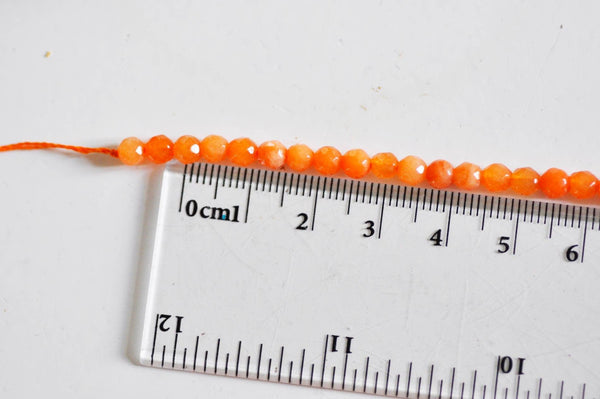 EP Perle jade orange naturelle facette 4mm, x1 fil de 90 perles G0270