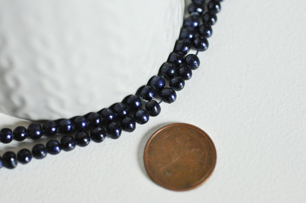 EP -perle eau douce naturelle noire 4mm,le fil de 38 cm, x1 G1256