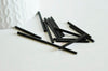 Grandes perles rocaille Tube noir 20x2.5mm, x 10gr (G3155)