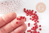 Grosses perles rocaille rouge transparente argent 4mm, x10gr (G3734)