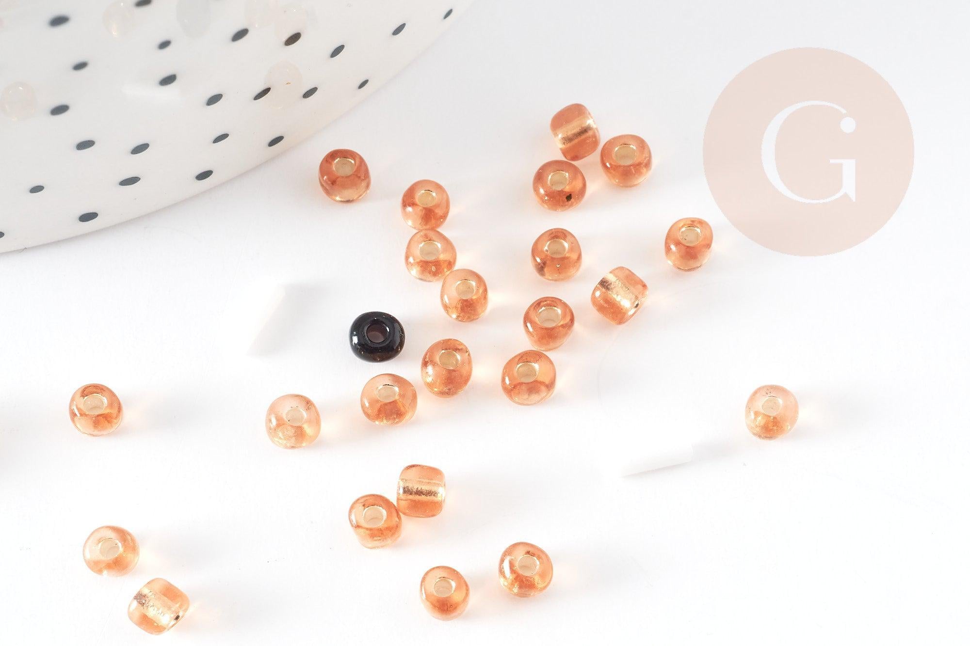 Grosses perles rocaille dorée transparent 4mm, x 10gr (G1401)