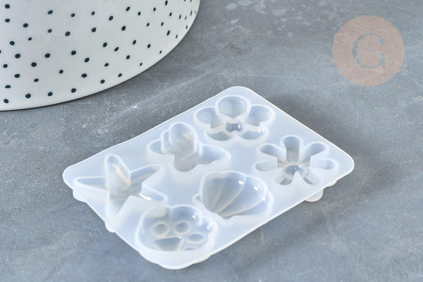 Moule pour fabrication bijoux formes fleurs coquillages résine 67x50x6mm, x1 G7996