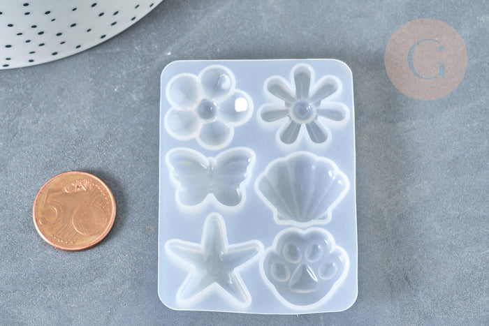 Moule pour fabrication bijoux formes fleurs coquillages résine 67x50x6mm, x1 (G7996)