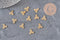 Pendentif triskel acier 304 inoxydable doré 18K 10mm, x1 (G11316)-Breloques et pendentifs-Gingerlily Perles