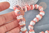 Perle Chat chanceux porcelaine rose 14mm, perle céramique, fabrication bijoux animal, perle chance chat, x5 (G7998)