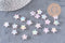 Perle étoile plastique acrylique rose irisé 11mm, x 30 (7.4gr) (G3493)
