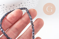 Perle nacre noire naturelle heishi, tube coquillage ivoire, 2x4mm, fil de 95 perles, x1 (G5417)