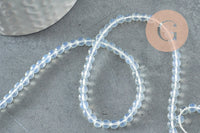 Perle opalite blanche ronde percée 4mm, 1x fil de 39.8cm (G8422)