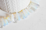 Perle ovale opalite roulée synthèse 13-22mm, x1 fil (G1476)