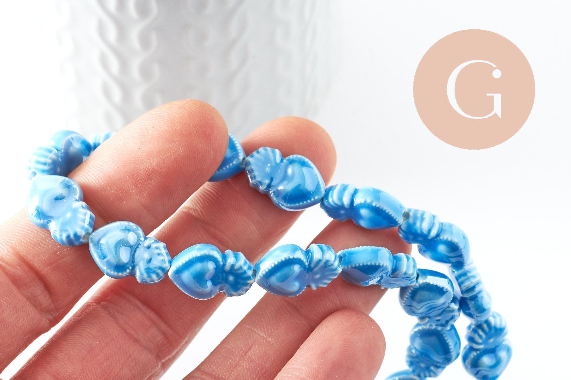 Perle porcelaine coeur bleu clair irisé 16mm, x24 (G9798)