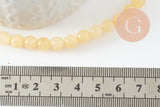 Perle ronde jade naturel jaune clair 6mm, x1 fil de 19cm (G2085)