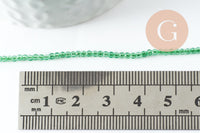 Perle ronde verre facettée transparente vert clair 2mm, DIY, fil de 37cm, x1 (G7445)
