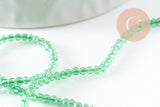 Perle ronde verre facettée transparente vert clair 2mm, x1 fil de 37cm (G7445)