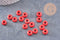Perle rondelle donut verre opaque rouge 3-5x9mm, x 20 (G4597)