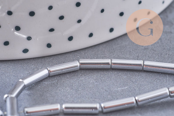 Perle tube hématite argentée 9.5mm, x1 fil de 19cm (G4484)