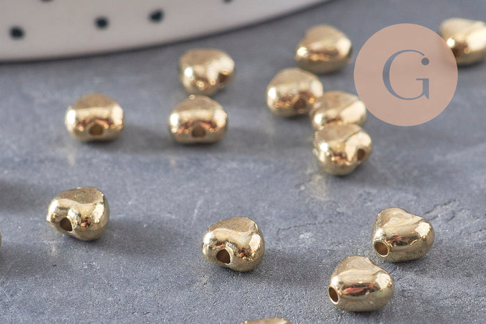 Perles coeur bombé plastique doré 5.5mm, x 10g (G10979)