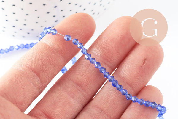 Perles cristal toupies à facette bleu transparent 3mm, x1 fil de 46cm (G2853)
