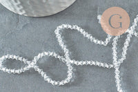 Perles cristal toupies facette transparent 3mm, x1 fil de 45 cm (G1632)