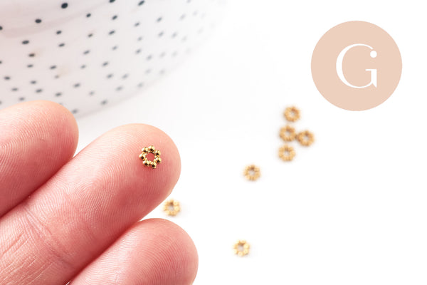 Perles intercalaires Rondelles fleurs acier 304 inoxydable doré IP 4mm, x10 (G10892)