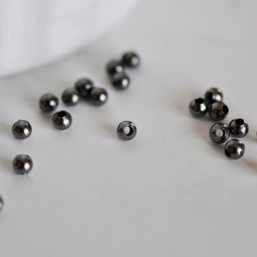 Perles intercalaires noires métalgun 3mm, x10 grammes (G2441)