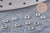 Perles intercalaires rondelles fleurs acier 304 inoxydable platine 3mm, x10 (G10855)
