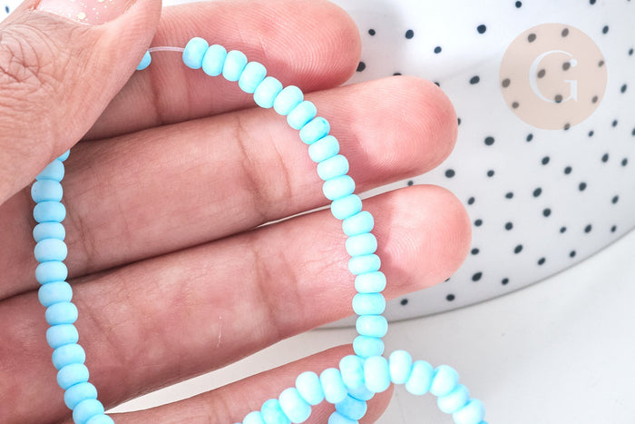 Perles porcelaine abacus bleu clair 4x3mm, fil de 38cm, x1 (G7808)