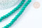 Perles ronde résine verte 7mm, fil de 40cm, x1 (G7221)