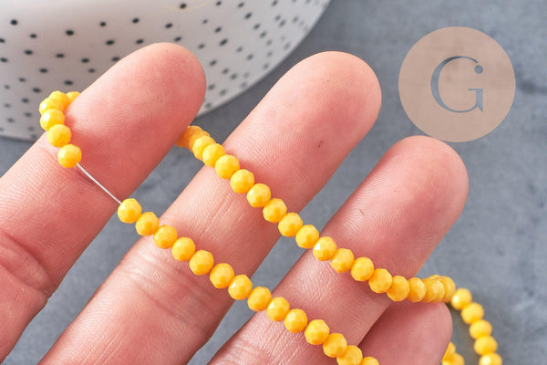 Perles rondelle cristal jaune 4x3mm, fil de 41 cm, x1 (G4072)