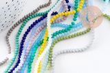 Perles rondelles verre transparente facettées 3.5x2.5mm, x1 fil de 32cm (G8262)
