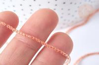 Perles rondes verre cristal beige facettes 2mm, x1 fil de 38cm (G7947)