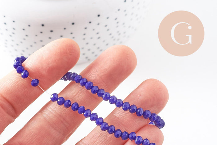 Perles toupies bleu, cristal bleu marine,Perle verre facette, 4x3mm ,fil de 49 cm , x1 (G2720)