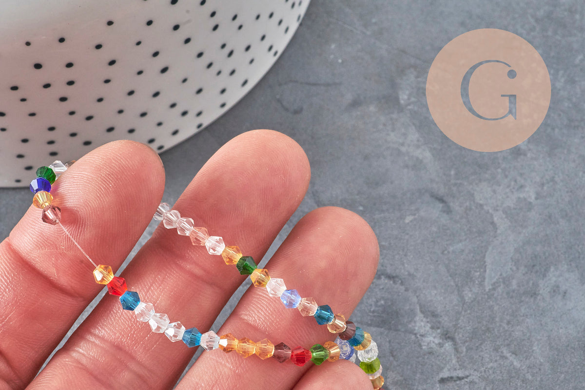 Perles toupies cristal à facette multicolore 3.8x3mm, x1 fil de 32.5cm (G11344)-Perles-Gingerlily Perles